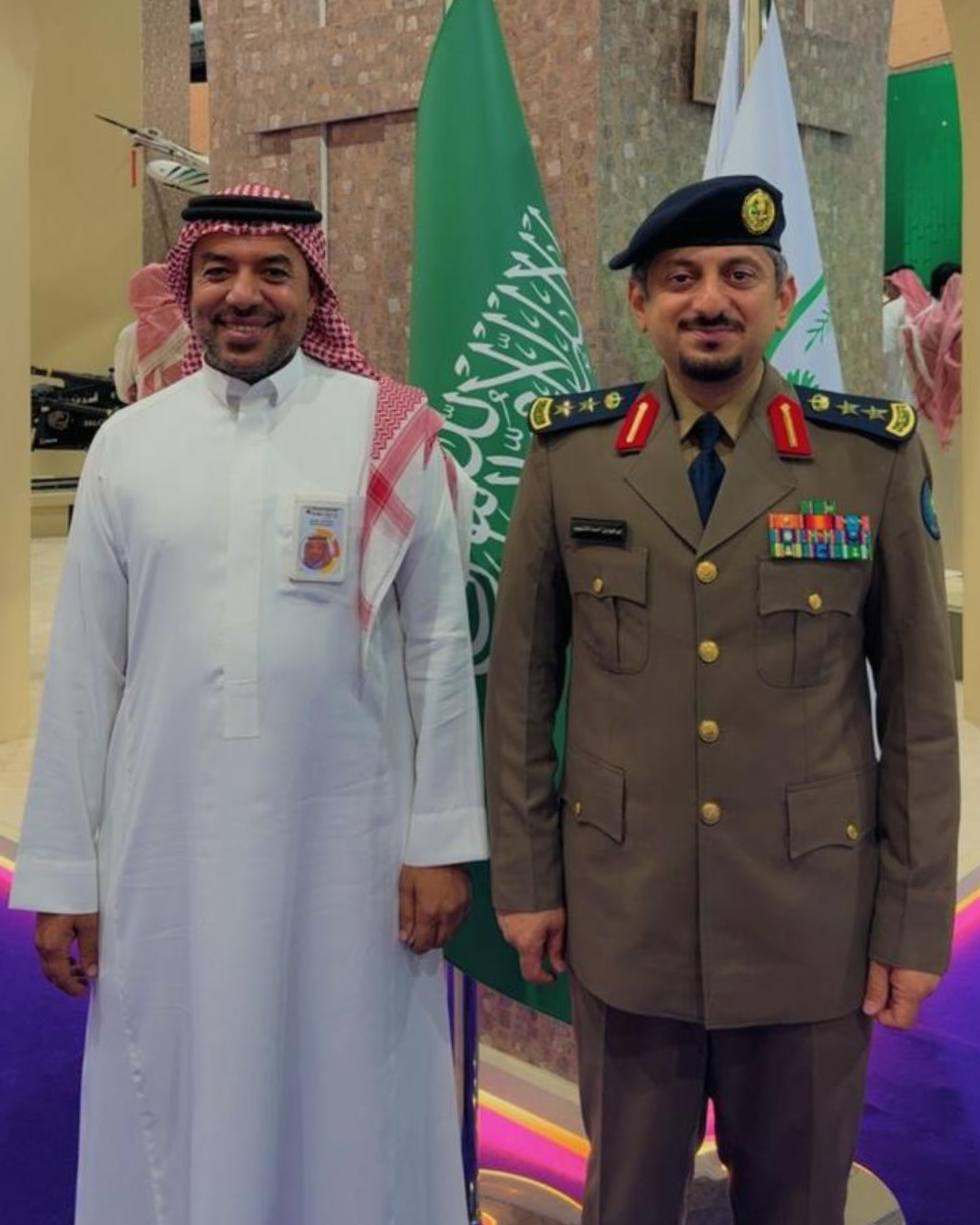 TechQode team member receiving an award alongside a Saudi official